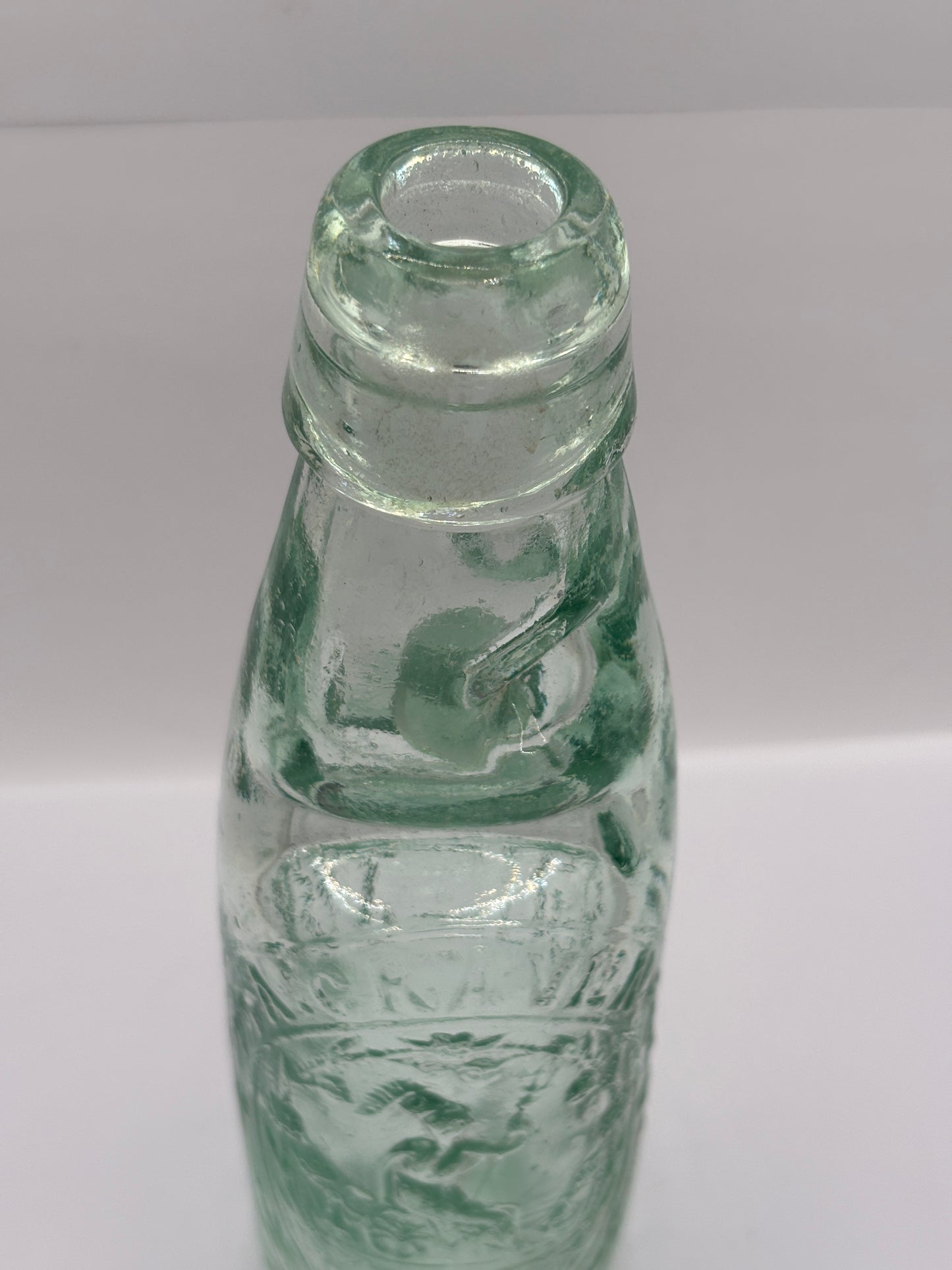 Old Hulme codd bottle, with marble. A.craven Hulme