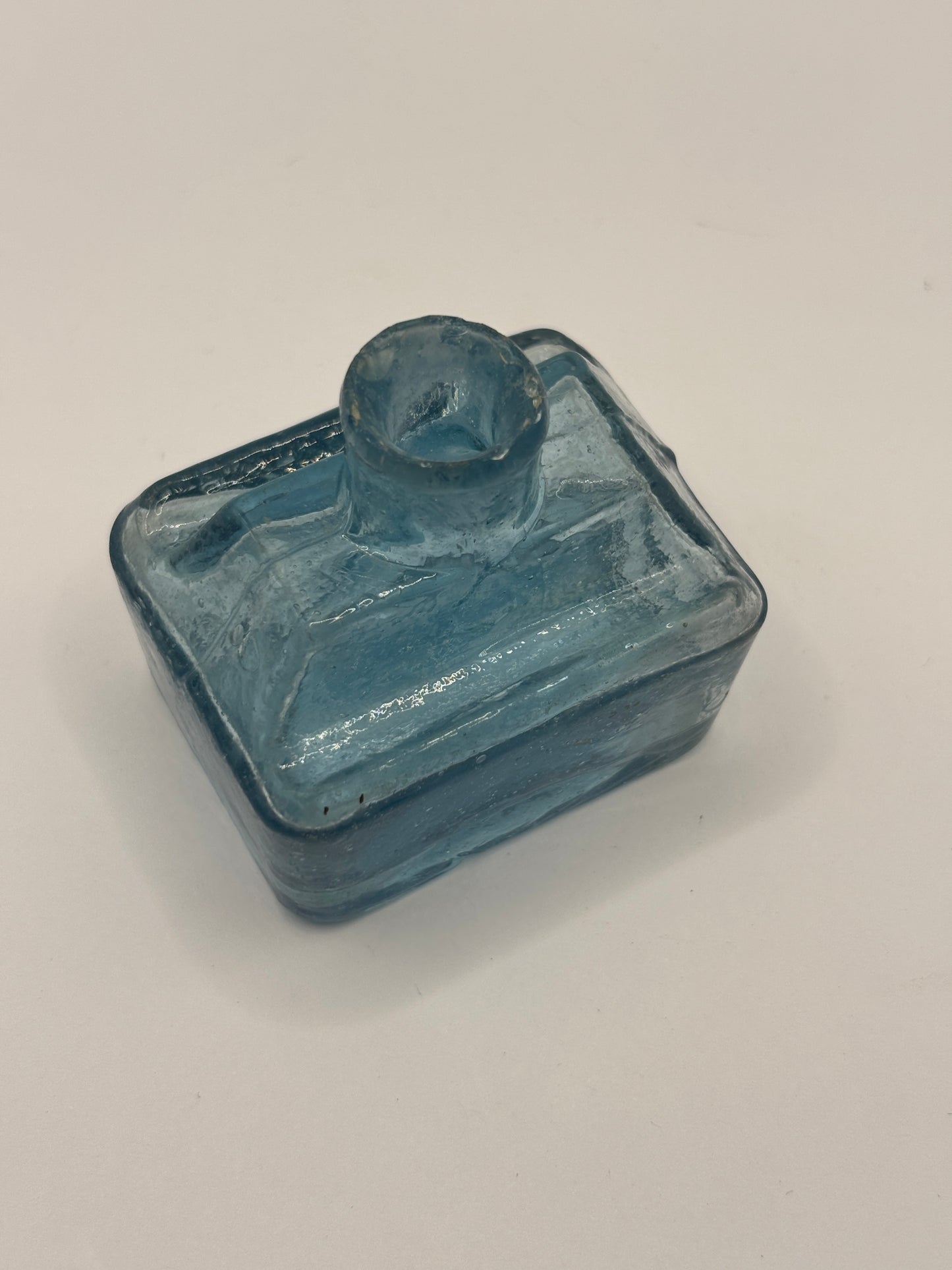 Old blue glass inkwell, ink bottle, penny ink. Boat ink
