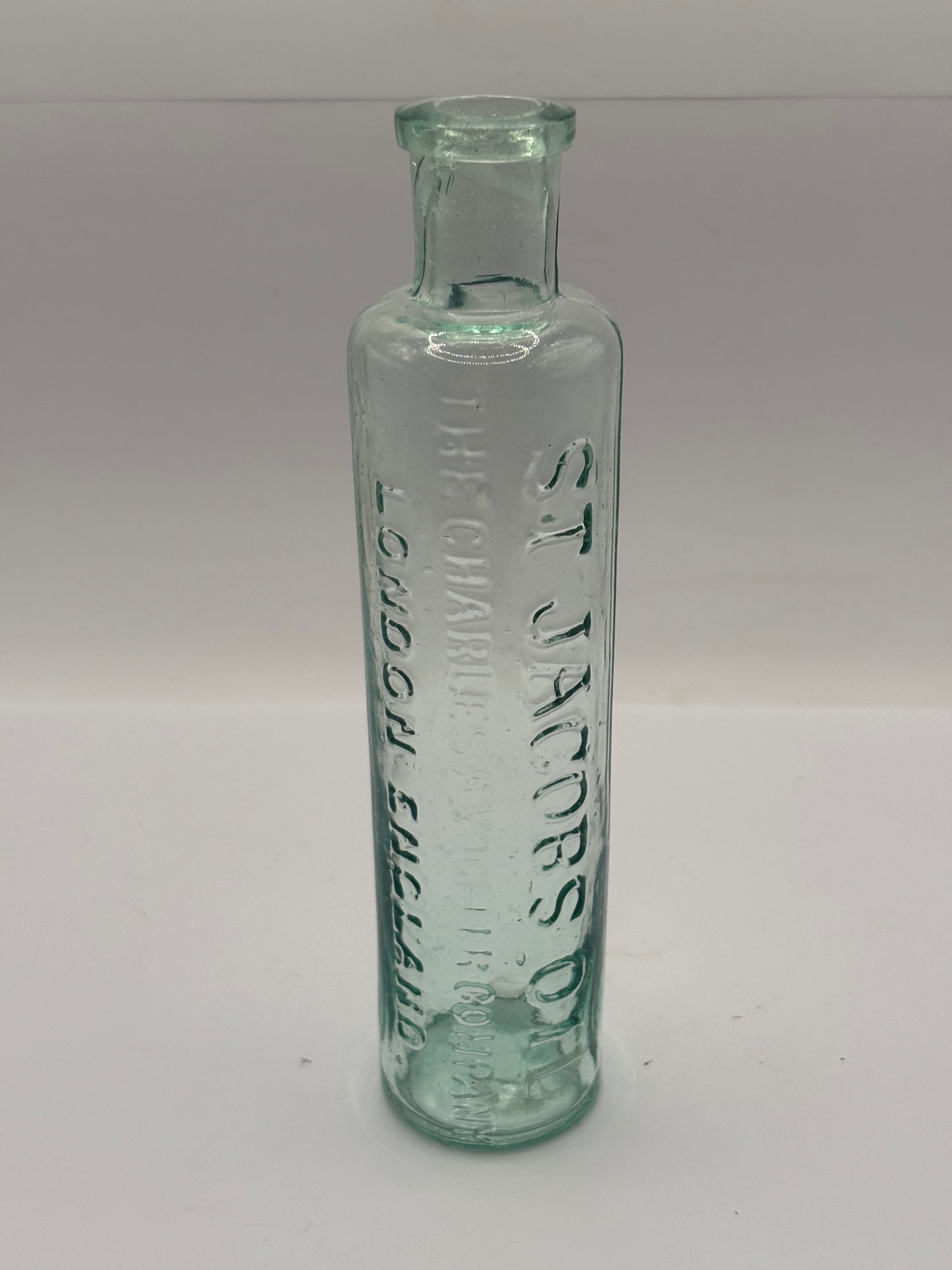 Old aqua glass bottle, St Jacobs oil