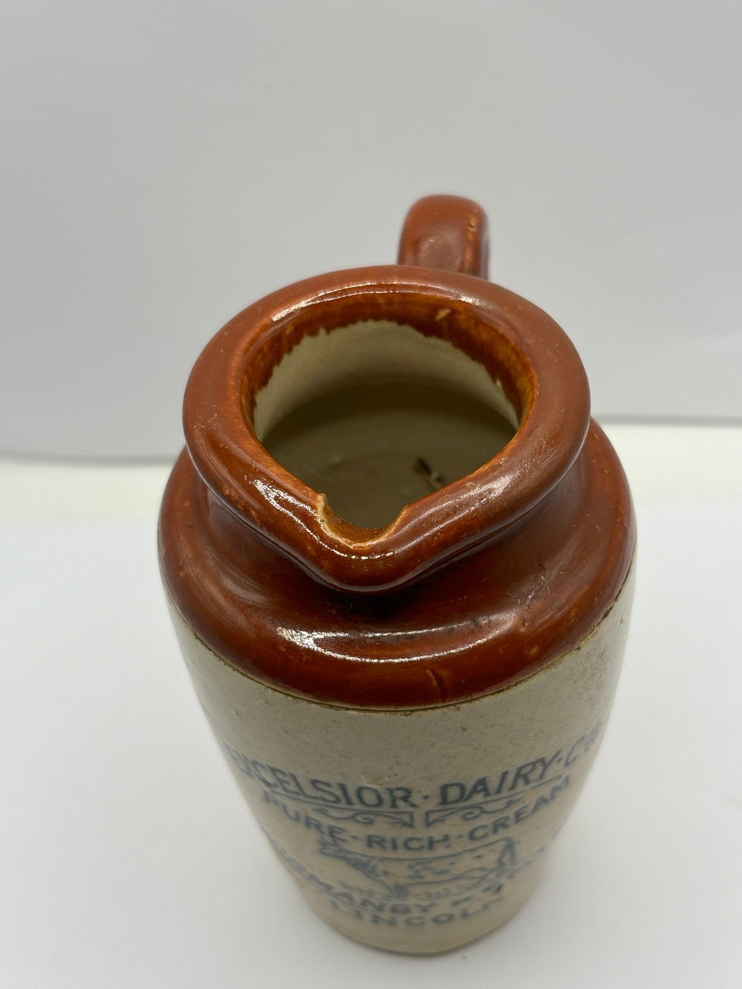 Excelsior dairy Co, Lincoln cream pot. Repaired