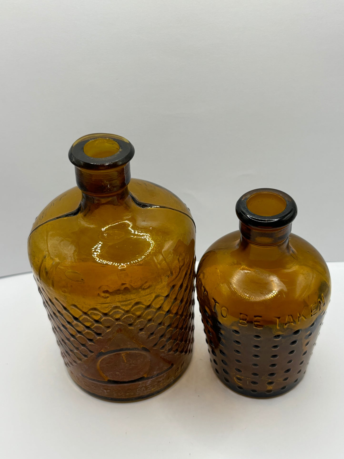 2 amber glass lysol bottles