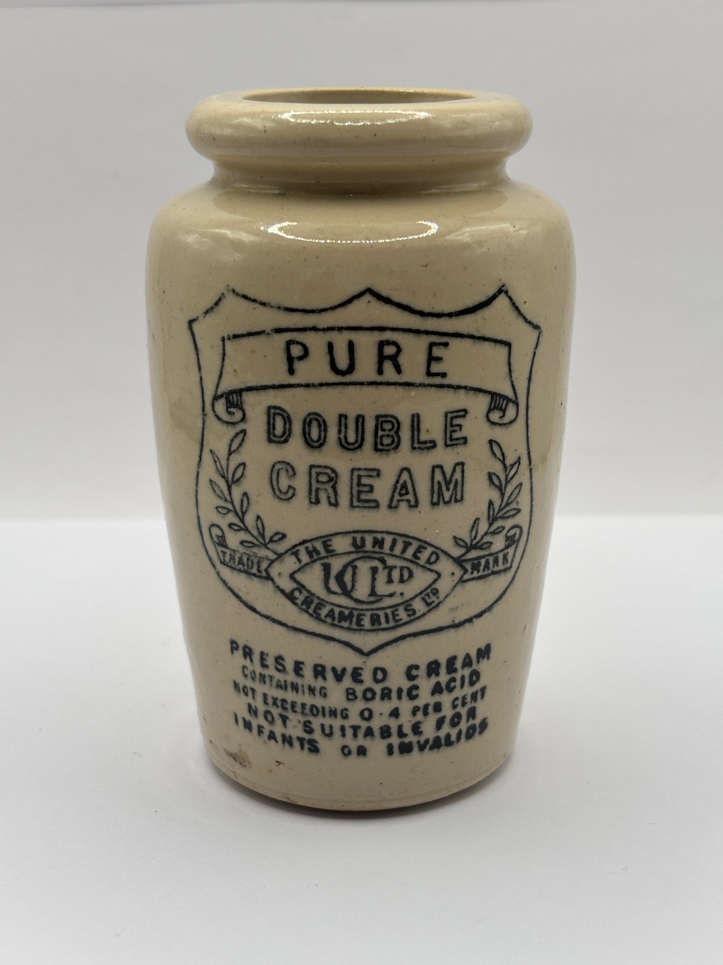 Old advertising stoneware cream pot, Pure double cream. The united creameries