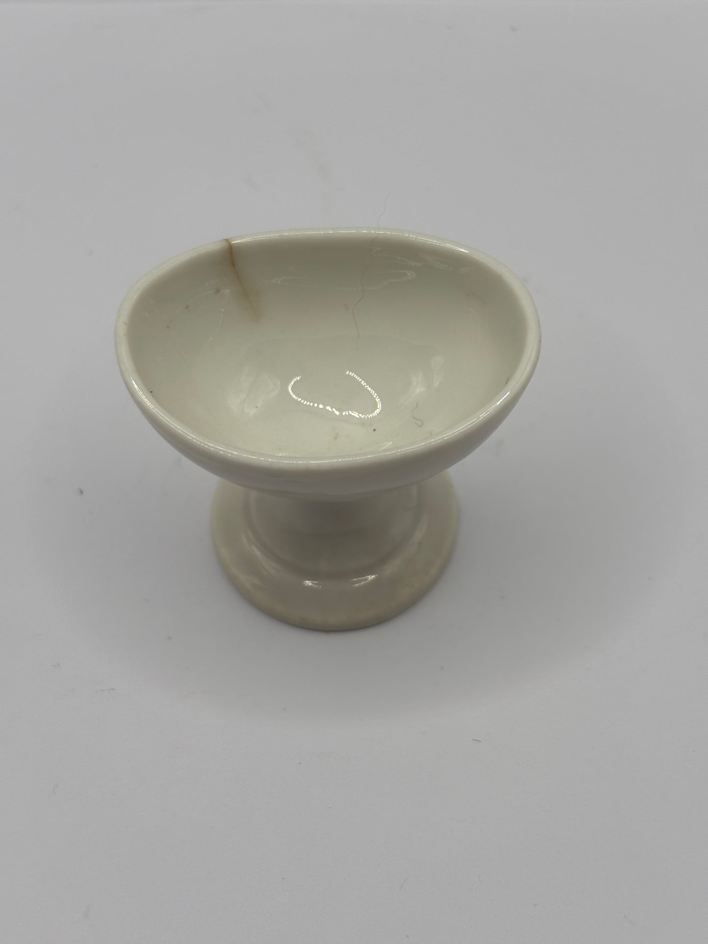Old porcelain eye bath