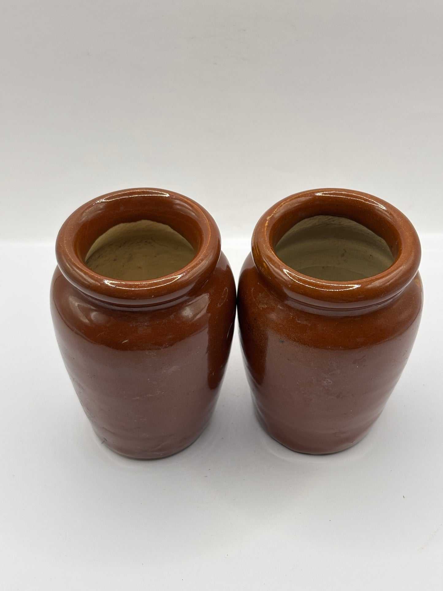2 old brown stoneware cream pots