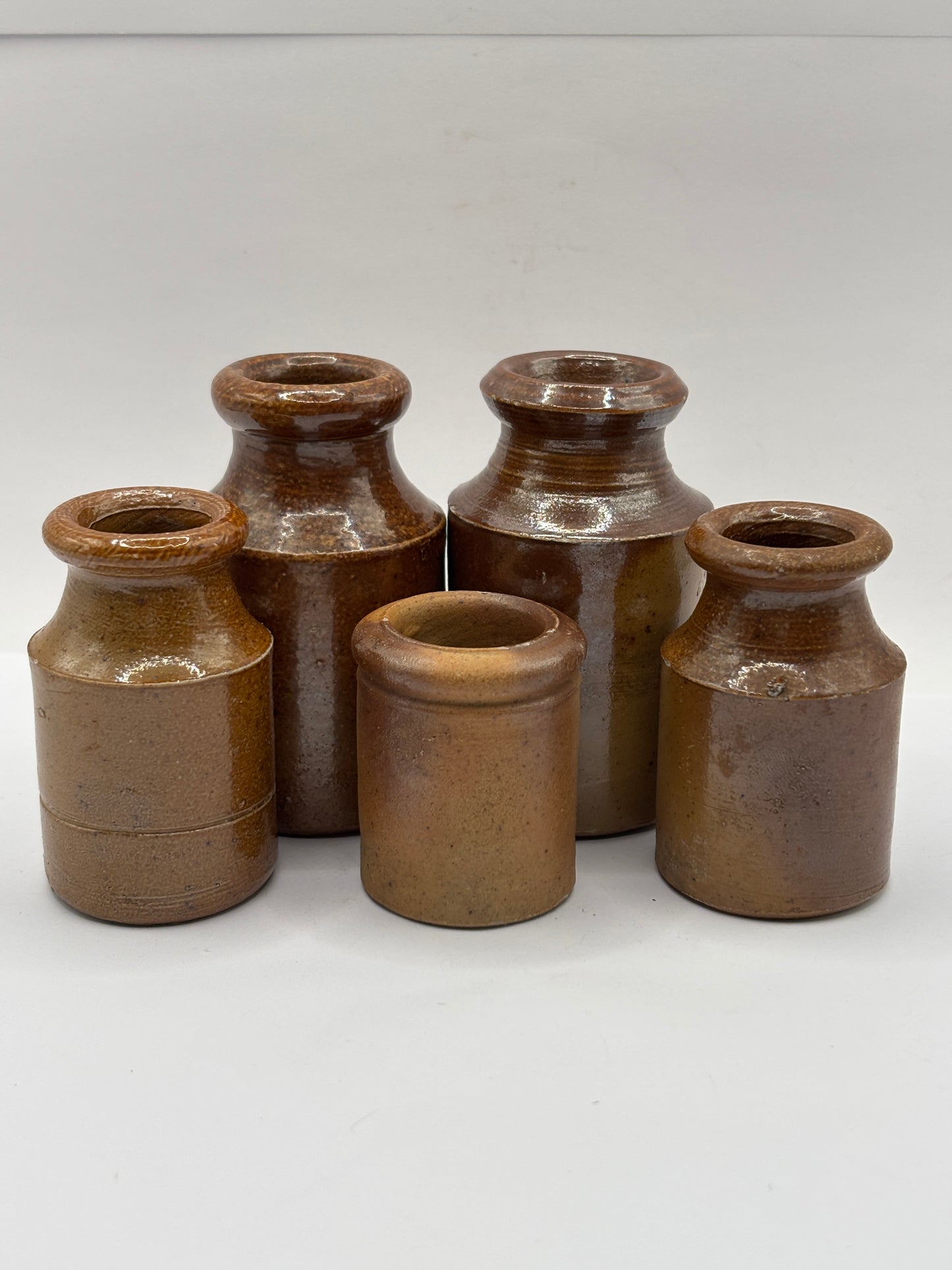5 old small brown stoneware jars