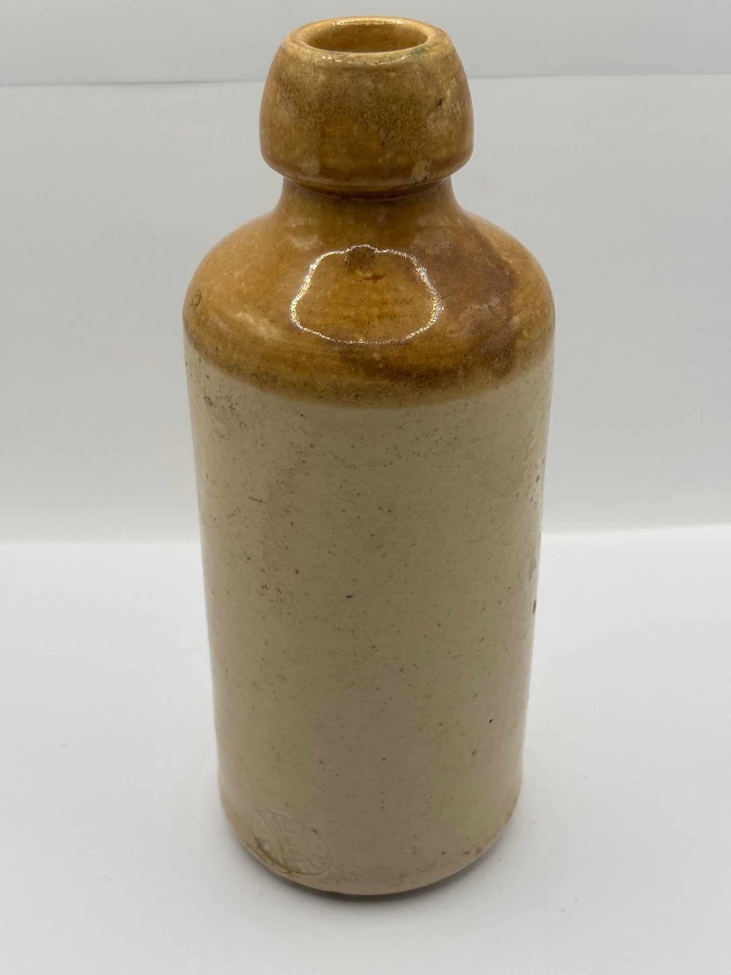Old impressed stoneware ginger beer bottle, Kinmond & Co Leamington