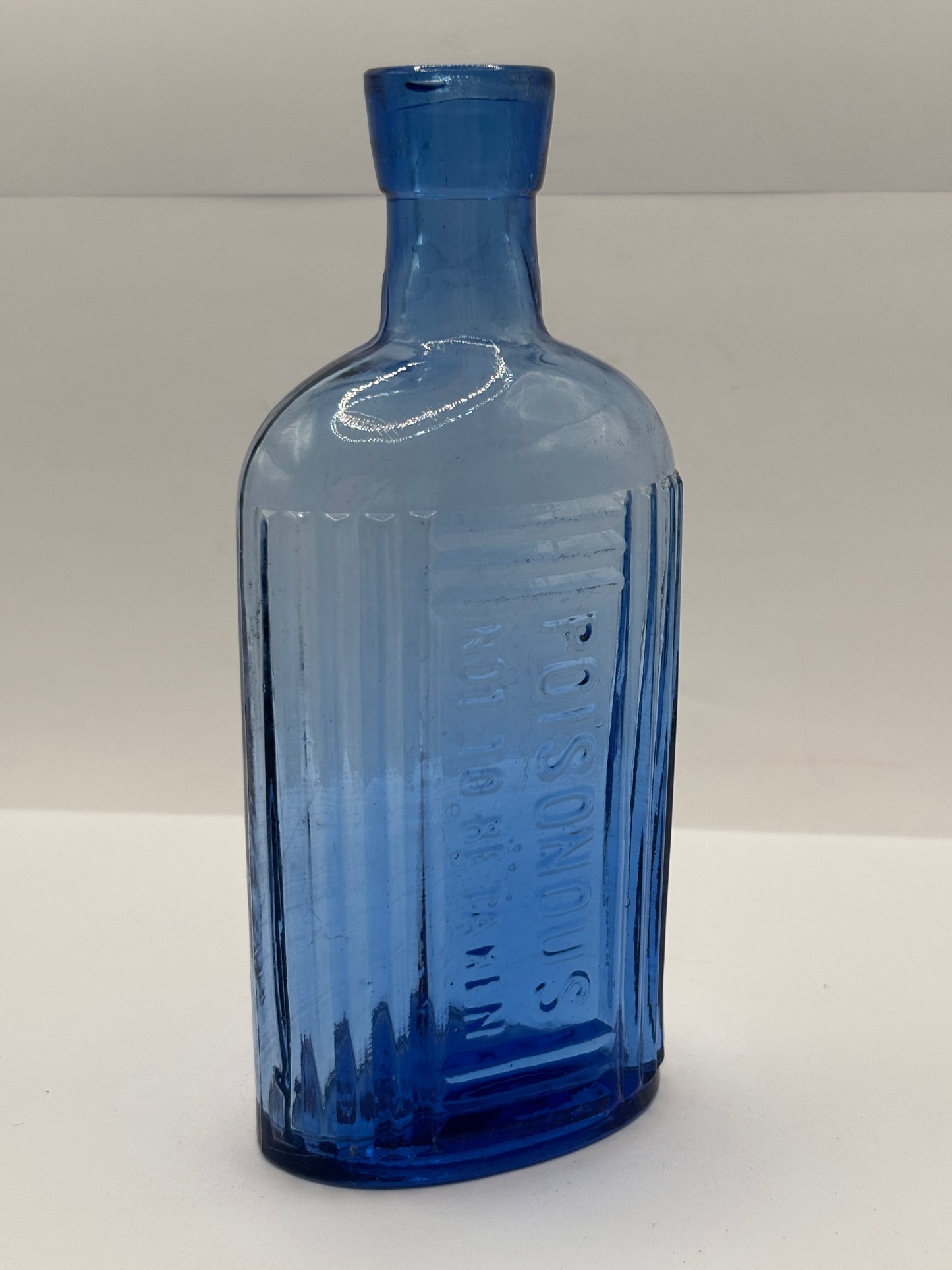 Old blue glass Poison bottle, Poisonous not to be taken