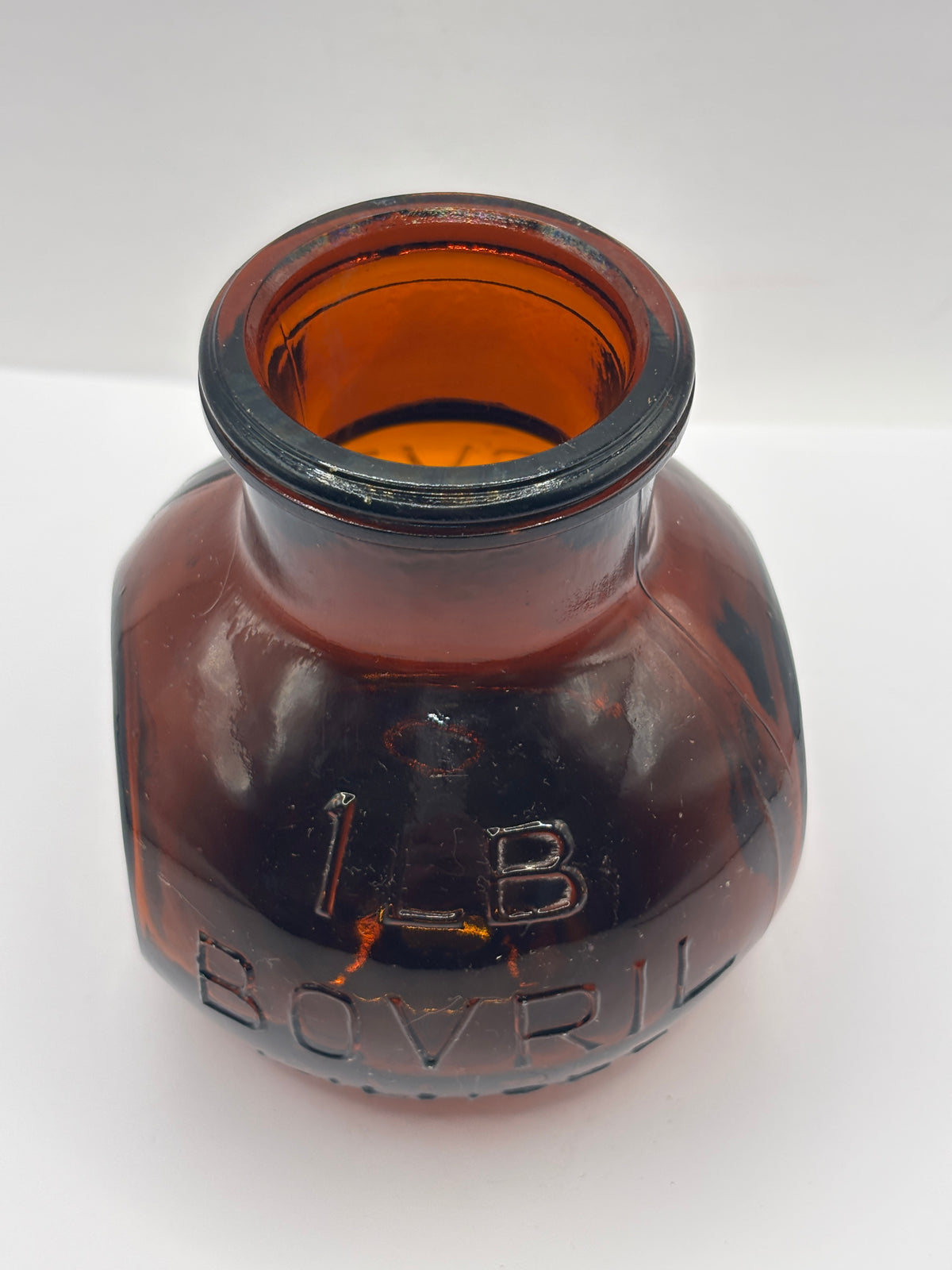 Old 1lb amber glass advertising Bovril bottle