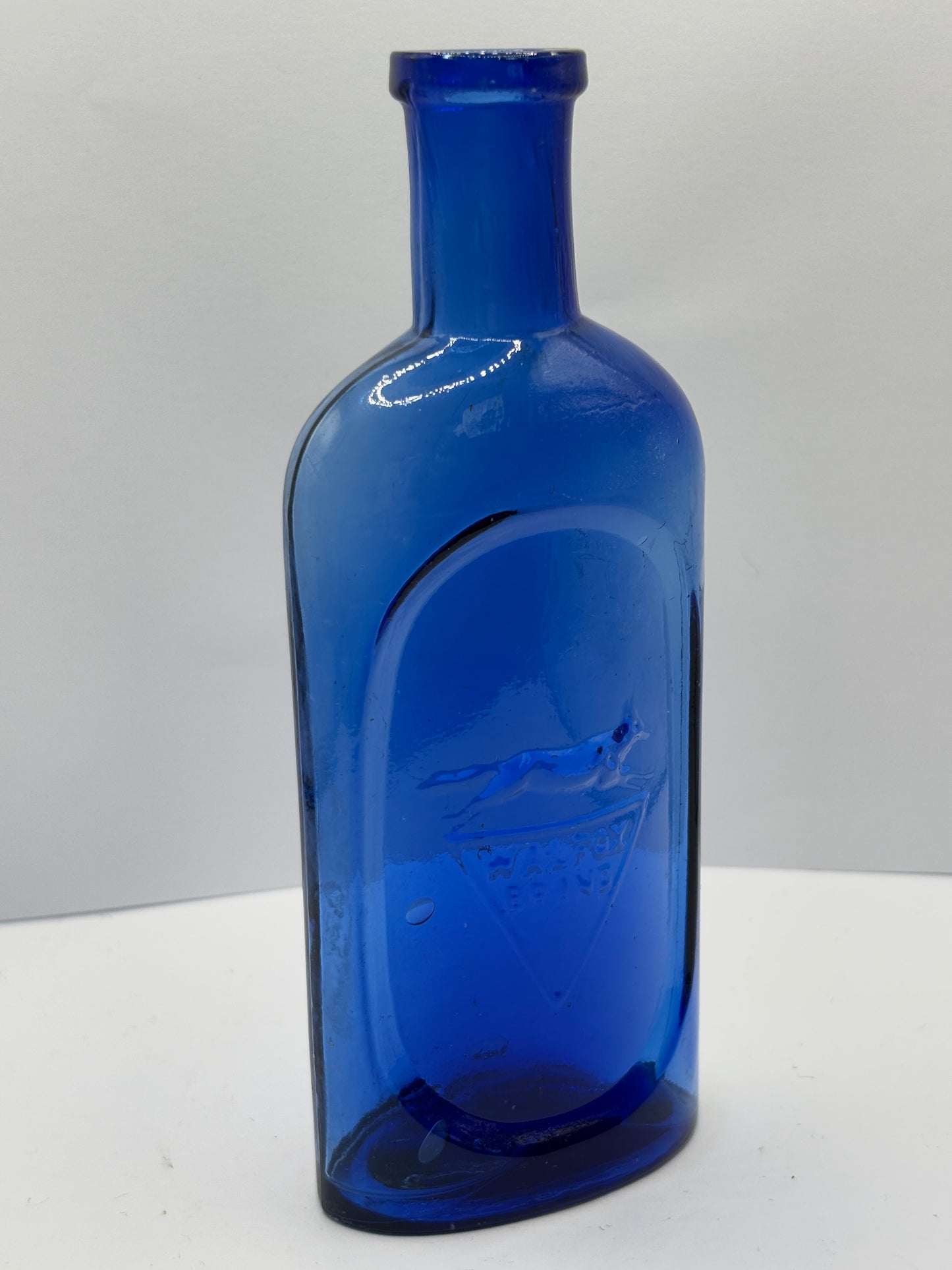 Old blue Walfox brand bottle