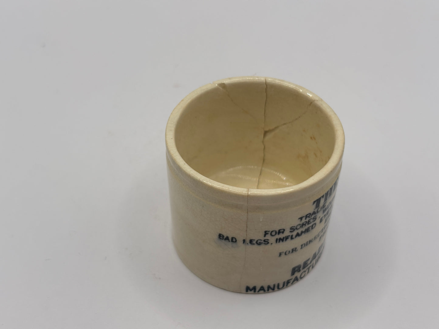 Old advertising ointment pot, The Egyptian salve. Damaged