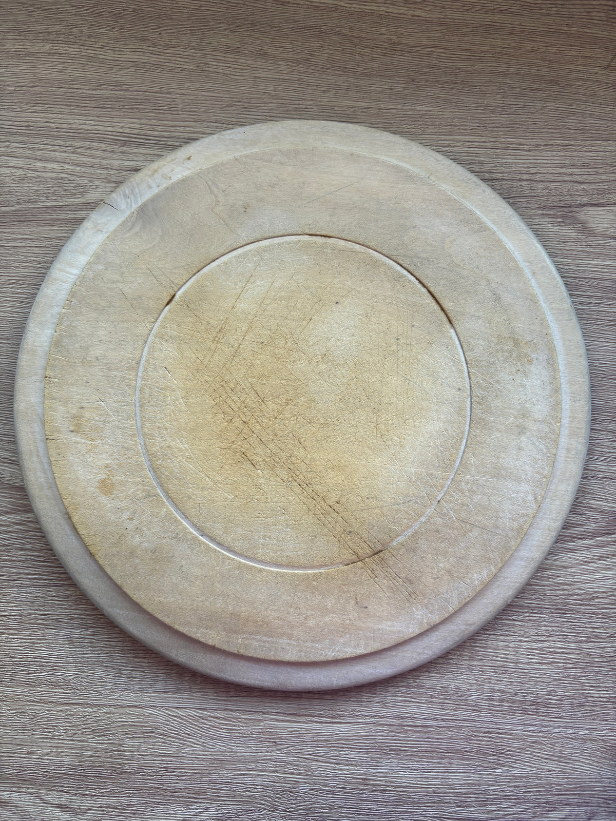 Old wooden carved bread board