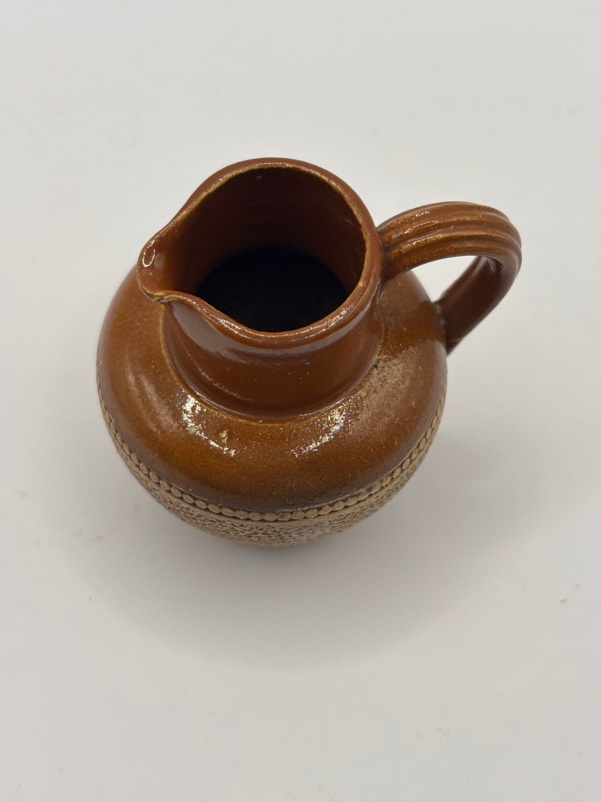 Old mini stoneware handled jug