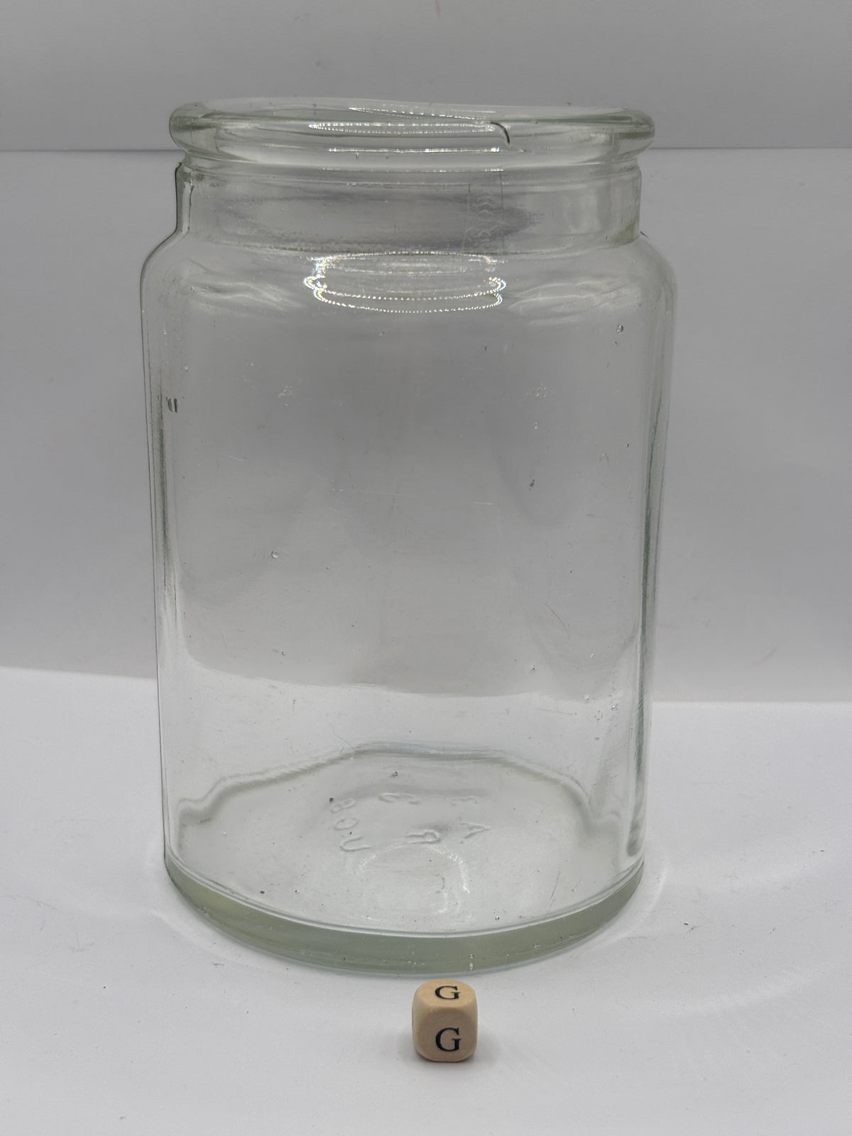 Old clear glass pickle jar (G)