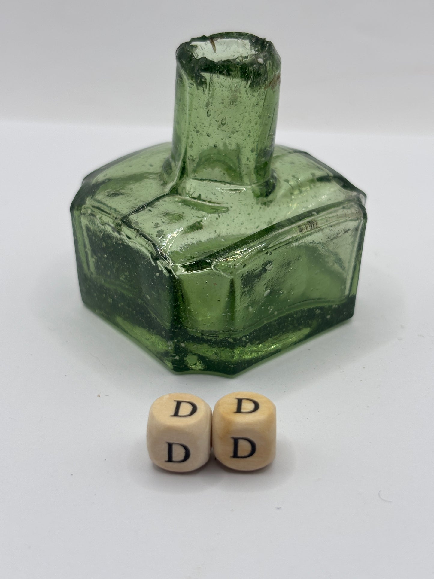 Old green glass ink, inkwell. (DD)