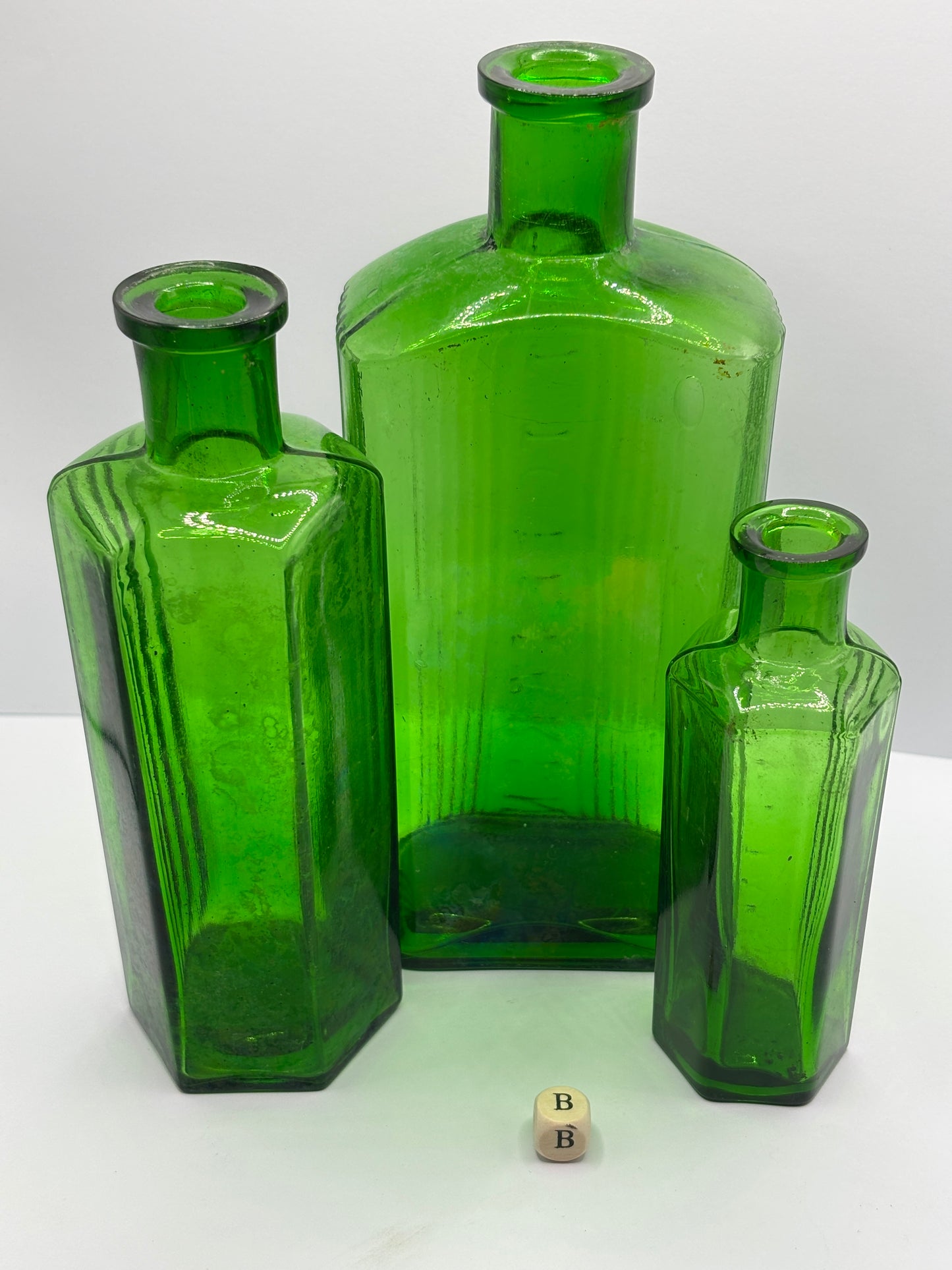 3 old green poison bottles, not to be taken