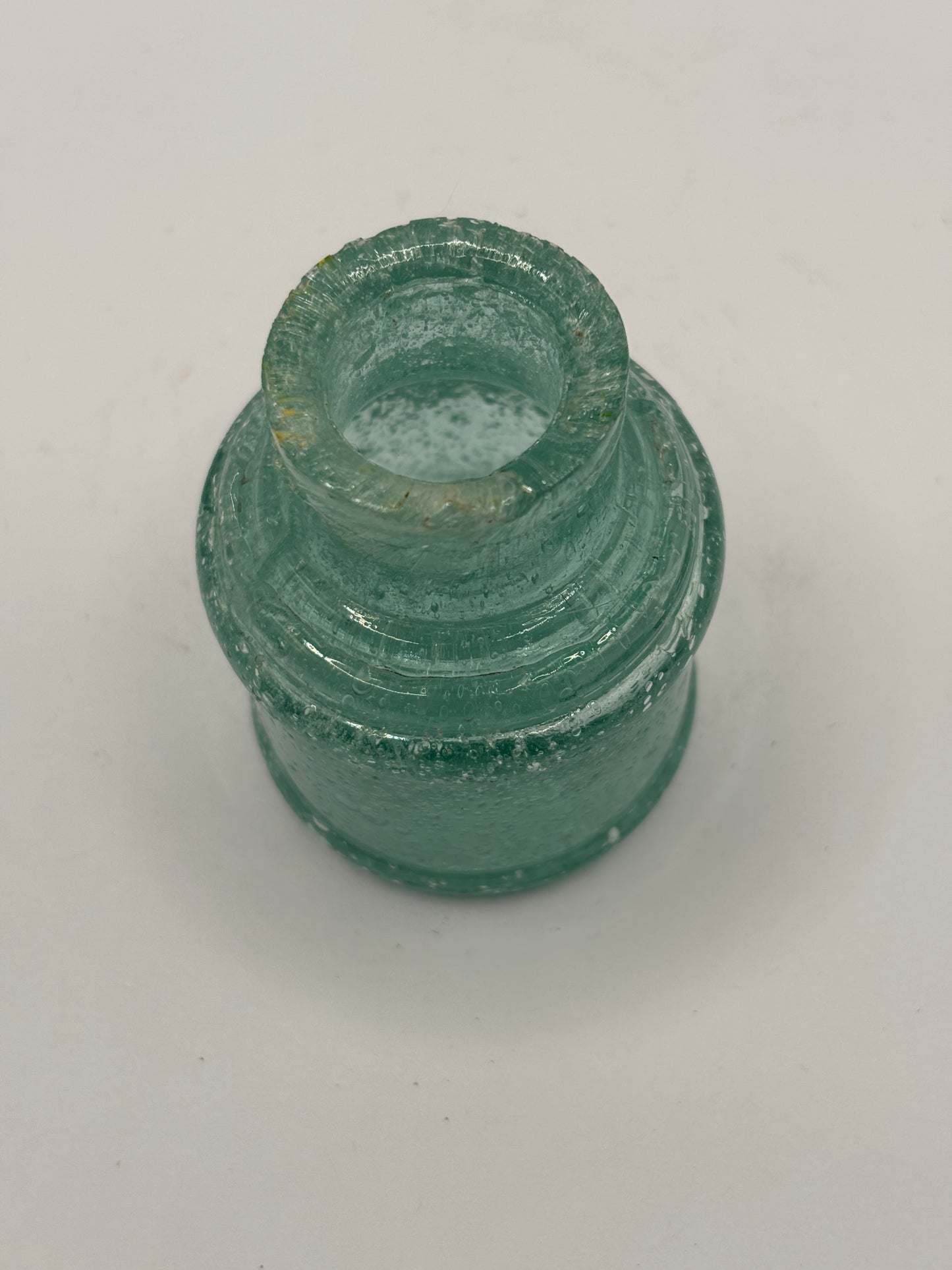 Old aqua glass ink with lots of bubbles