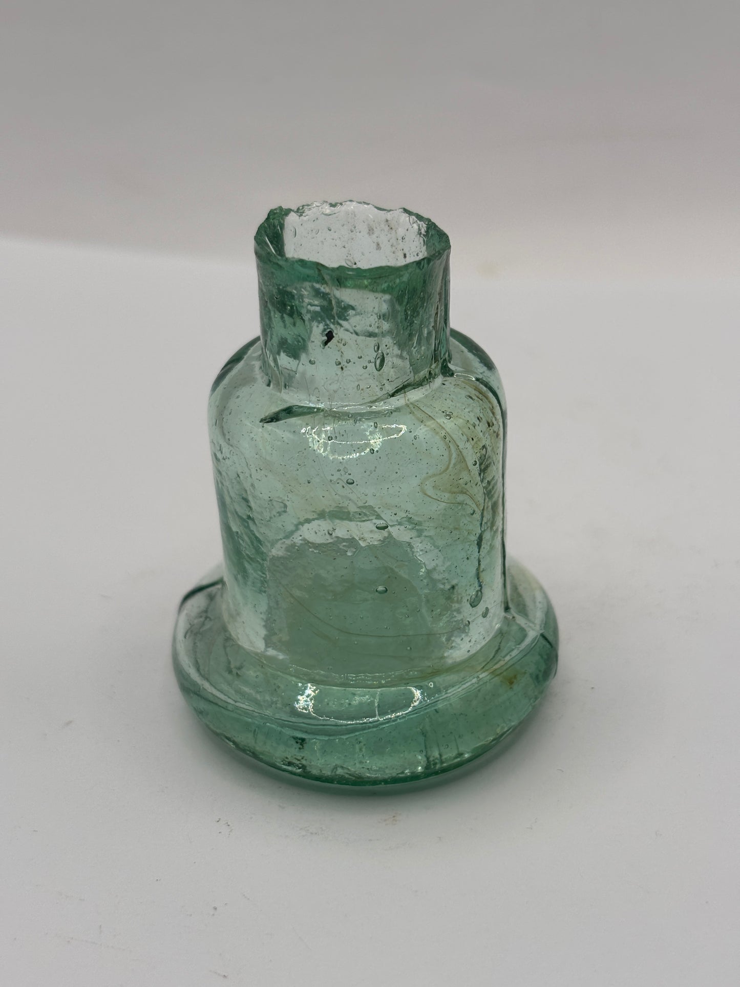 Old aqua glass inkwell, Bell ink. Ink bottle