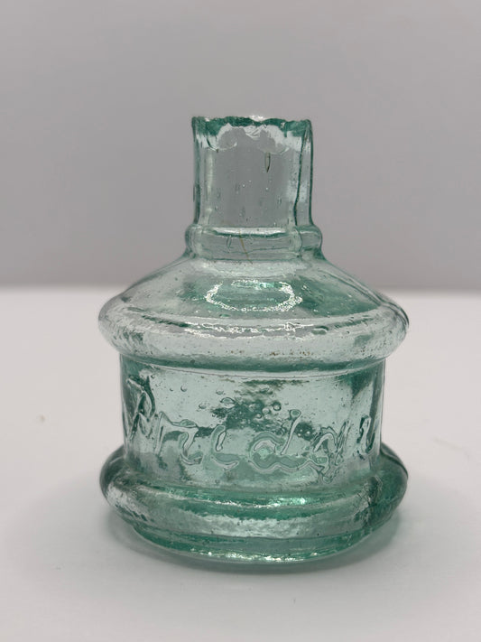 Old aqua glass advertising inkwell, ink bottle. Pridge