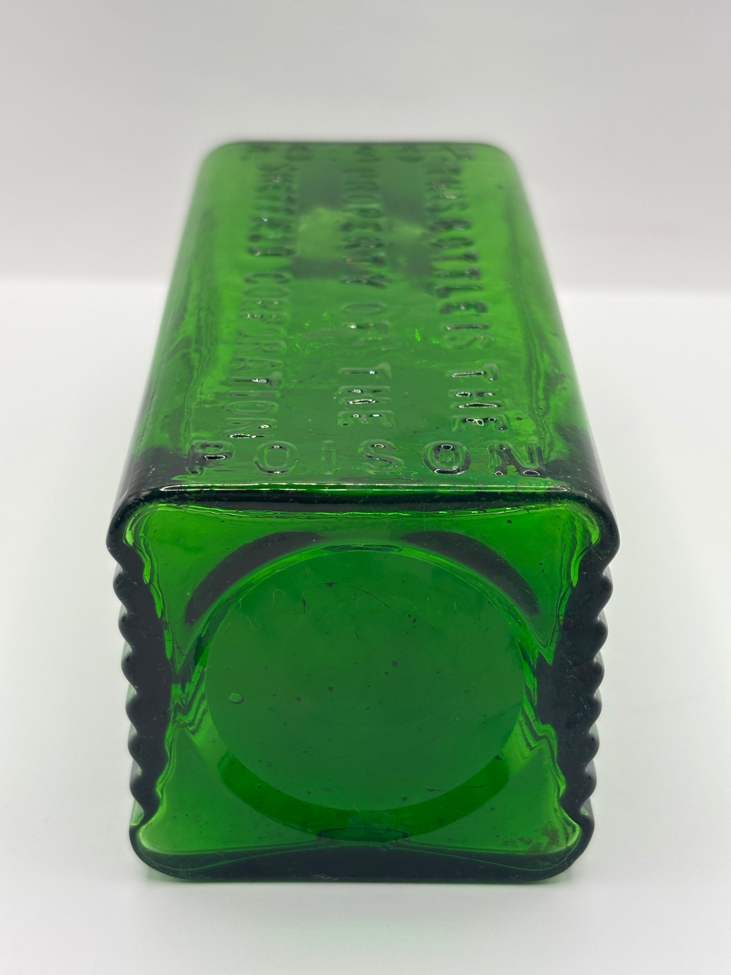 Old green glass poison bottle, Sheffield corporation poison bottle. Chipped