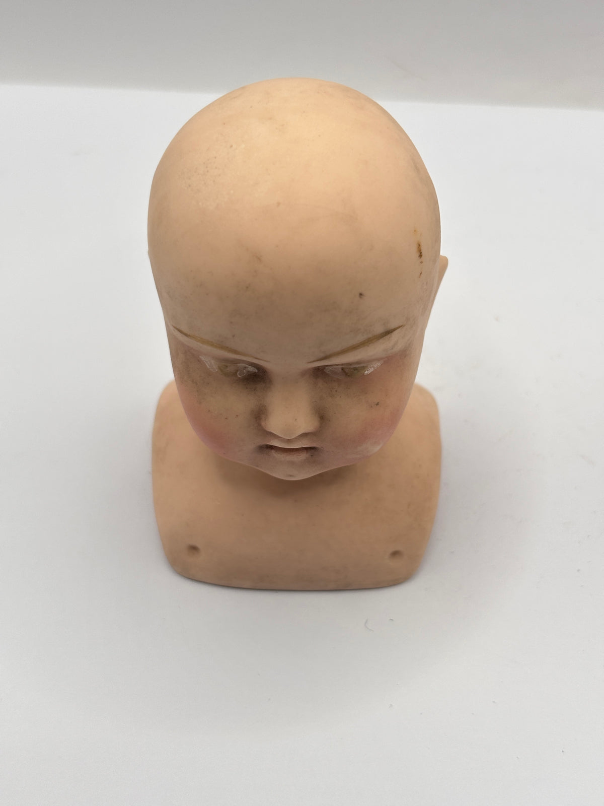 Old dolls head 9cms