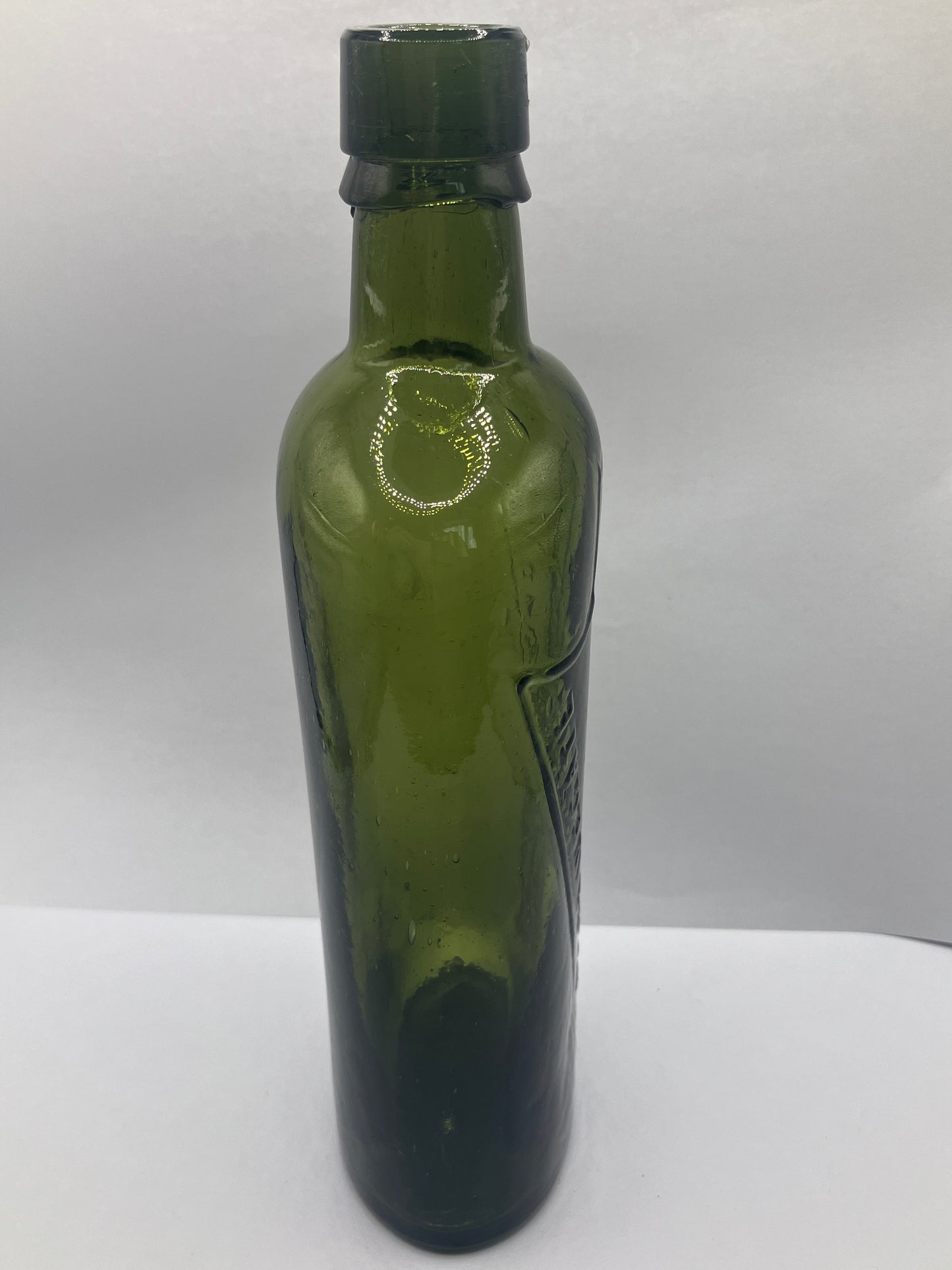 Dark green Bradford chemist bottle