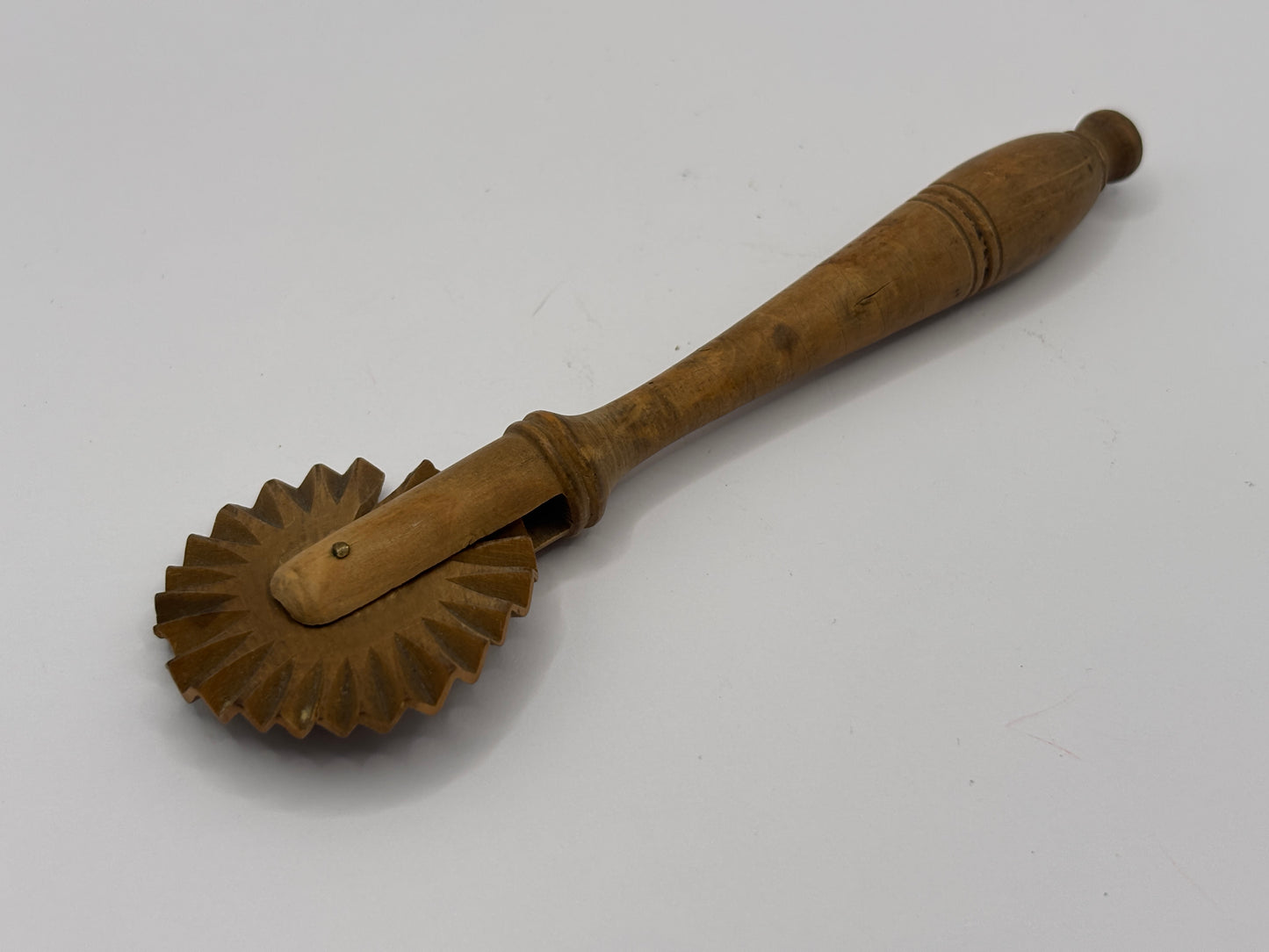 Vintage wooden pastry cutter, household