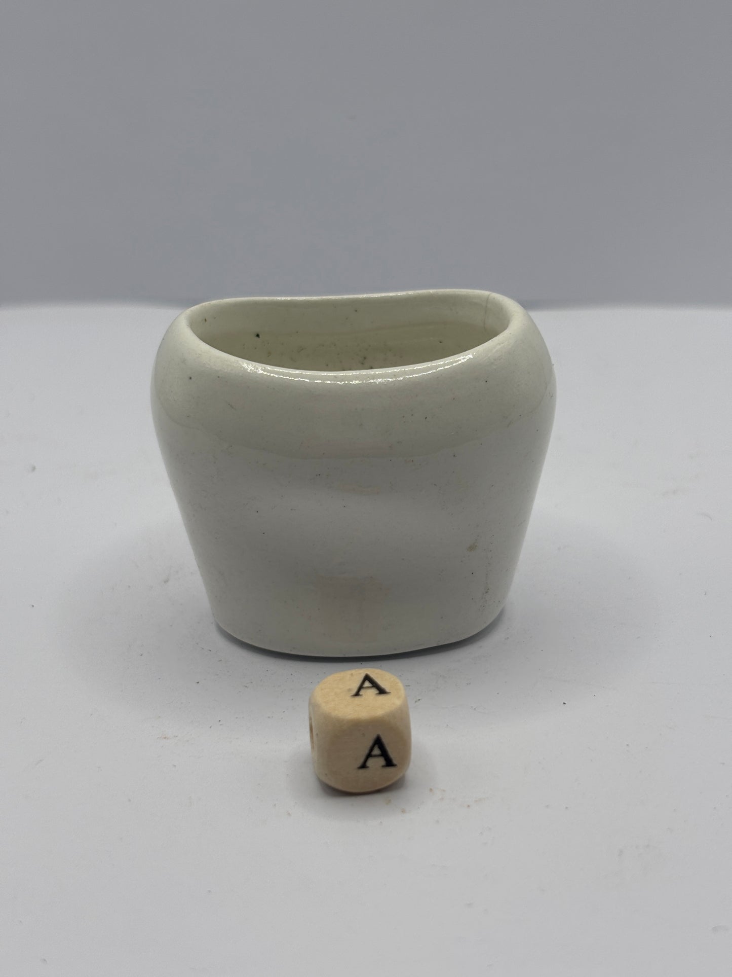 Old porcelain eye bath