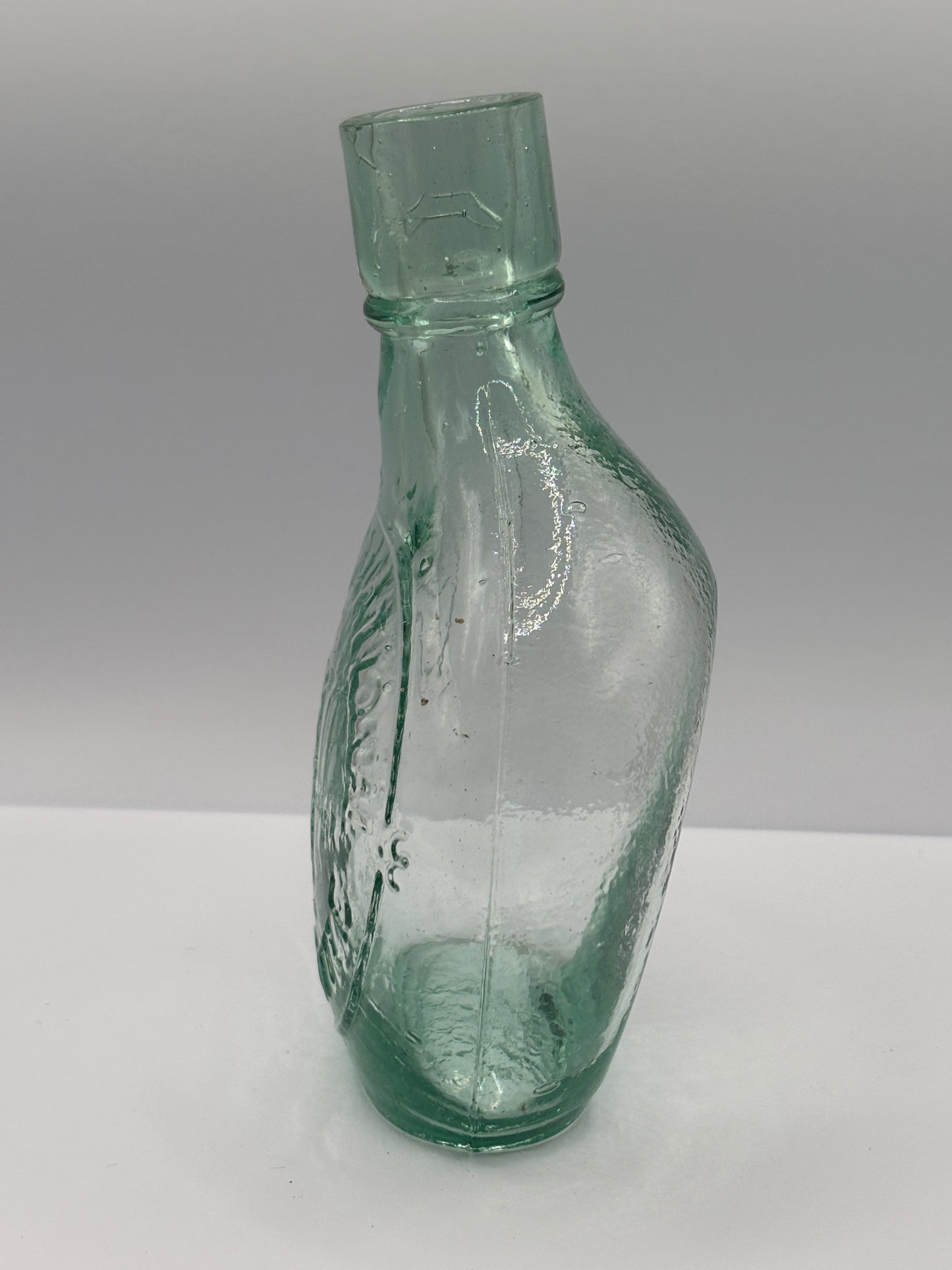 Old aqua glass baby feeder. The international feeder
