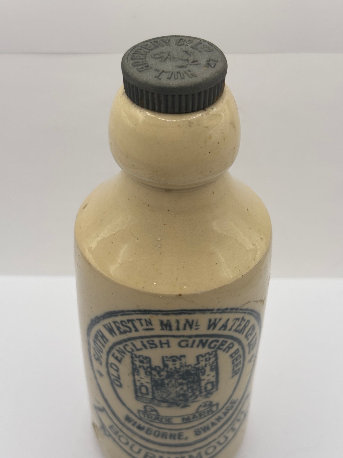 Old stoneware ginger beer bottle, south west mineral water Co, Bournemouth. Wimborne, Swanage