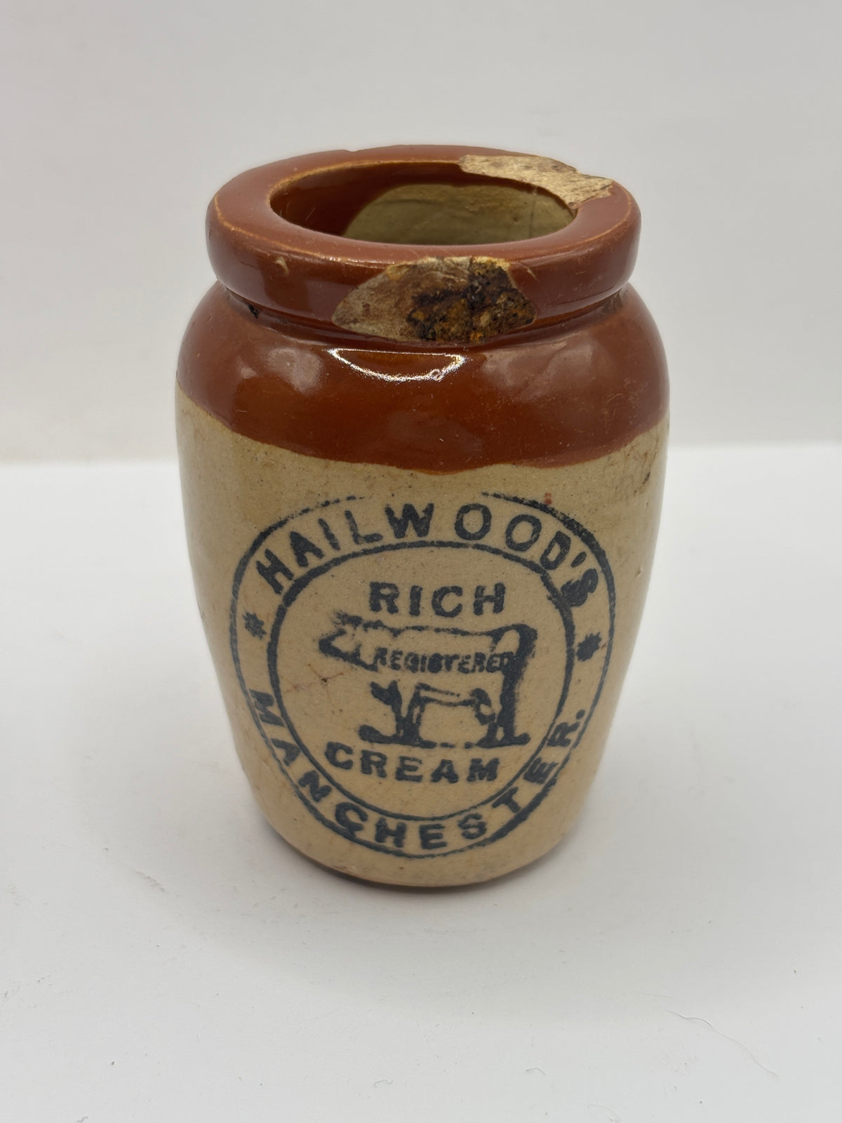 Old advertising cream pot, Hailwoods rich cream. Damaged