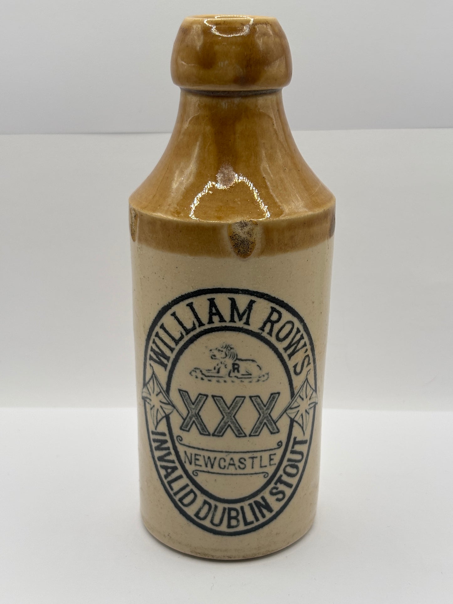 Old stoneware stout bottle, William Rows invalid dublin stout. Newcastle