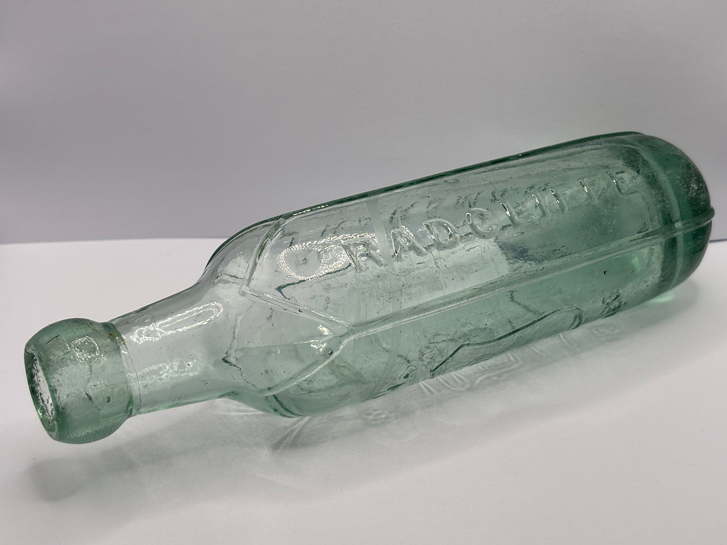 Old round bottom cylinder bottle, J.Hardman Radcliffe